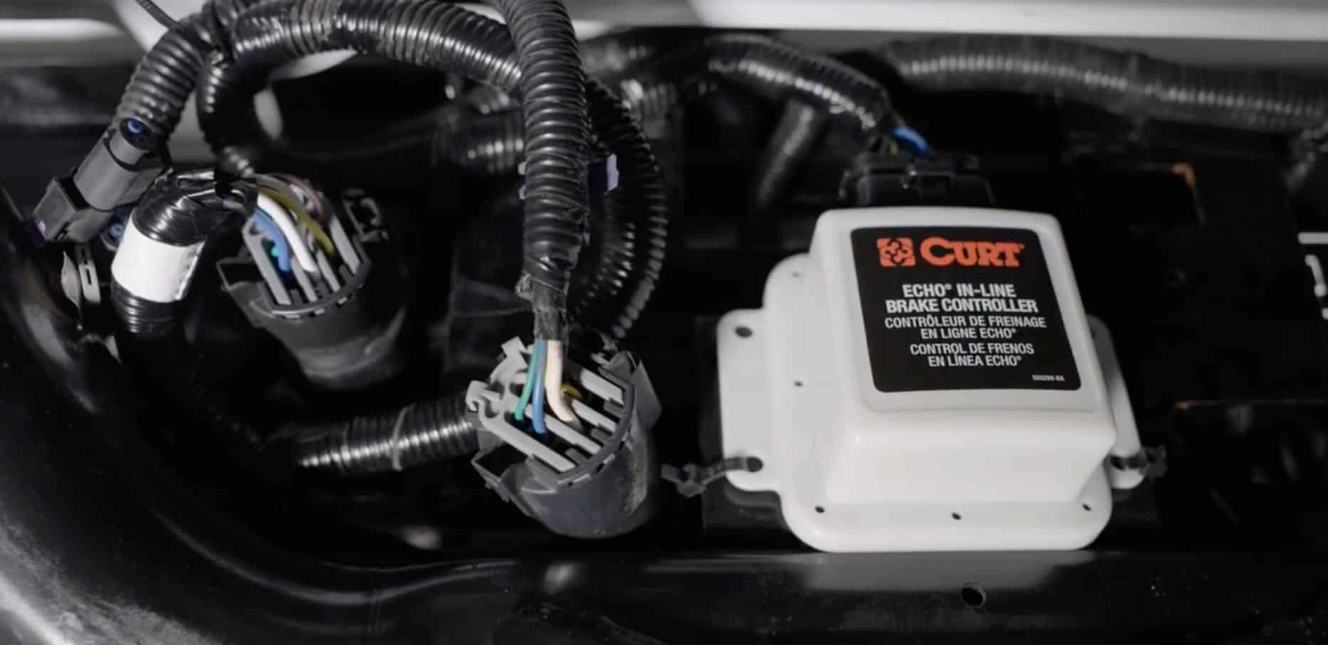 Brake control kit installed in a commercial van for safe trailer towing, featuring integrated trailer brake controller and wiring system